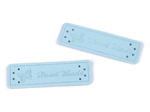 Applikation aus Kunstleder Hellblau Schrift Hand Made ca. 15x50 mm